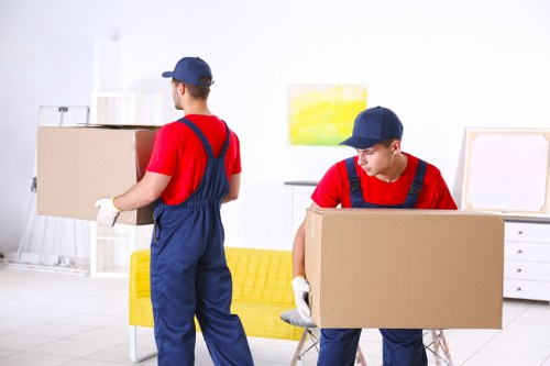 Moving team loading items safely into a van