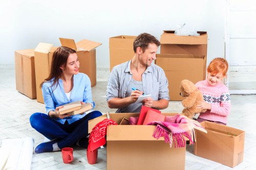 Professional movers handling furniture during a Twickenham house move