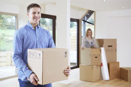 Team preparing for office removals in Twickenham with labelled boxes