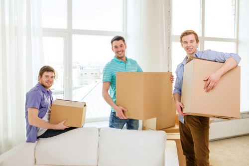 Unpacking boxes in a new Twickenham home interior