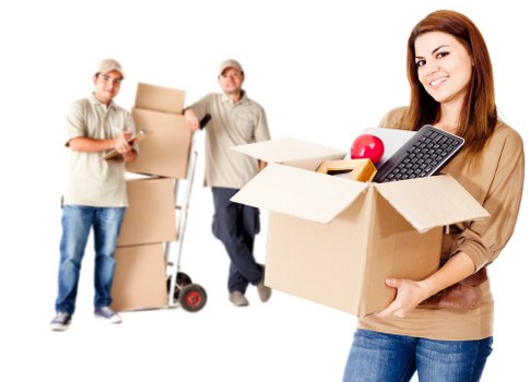 Packed office boxes and workspace items ready for a commercial move