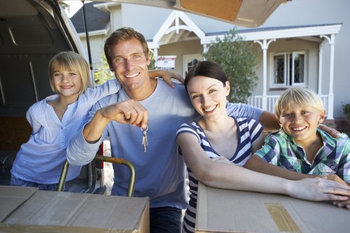 Careful packing of household items with boxes and wrap