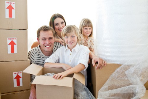 Professional movers loading items into a removal van in Twickenham
